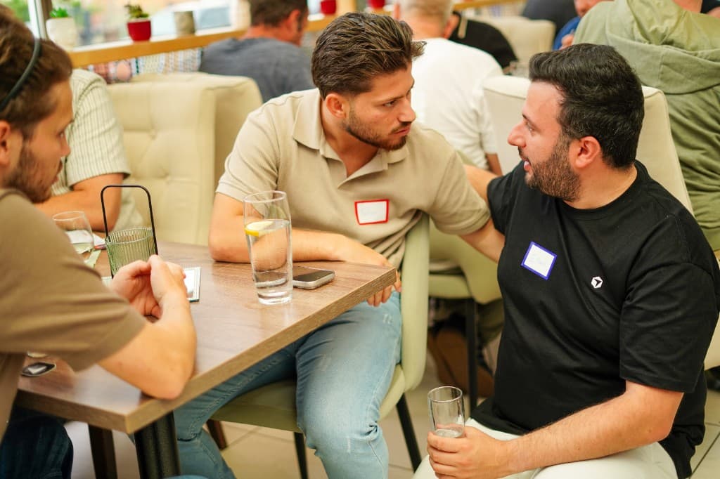 Eyad networking with attendees at a Frankfurt Build Day session